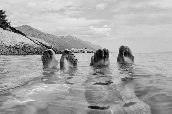 human feet on water