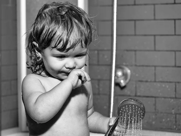 Small baby boy in shower — Stockfoto