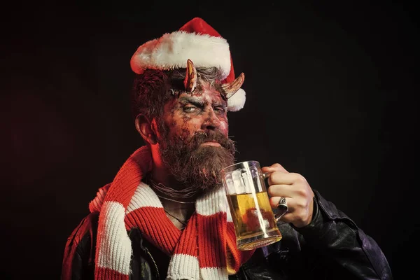 Halloween christmas man demon drink beer on black background — Stock Photo, Image