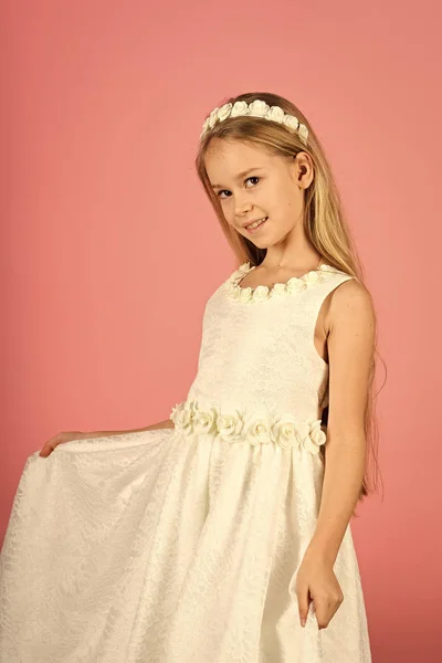 A happy little girl on the pink background — Stock Photo, Image