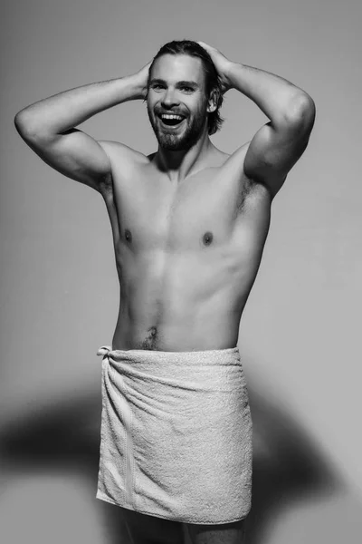 Happy man in white towel, morning wake up and shower — Stockfoto