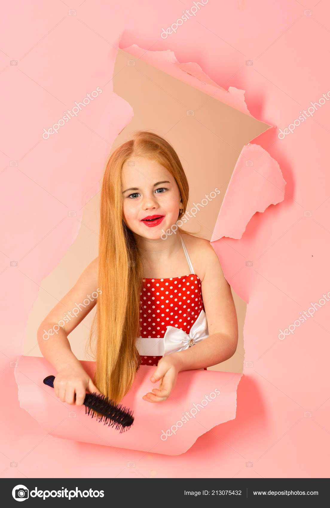 Hair Care And Pinup Style Hair Care Of Small Pin Up Girl Stock