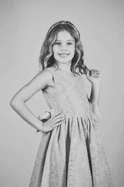 Beautiful little girl model wearing a pink dress — Stock Photo, Image