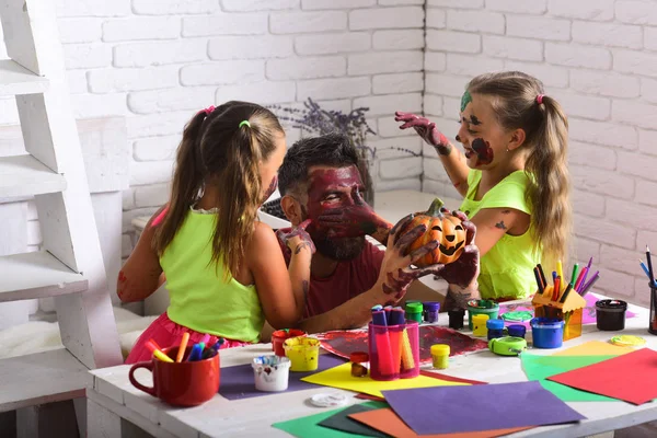 Halloween children with happy face in paint. — Stock Photo, Image