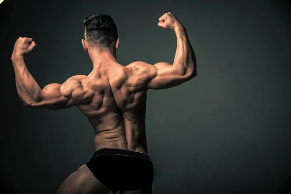 Man with muscular wet body and back. — Stock Photo, Image