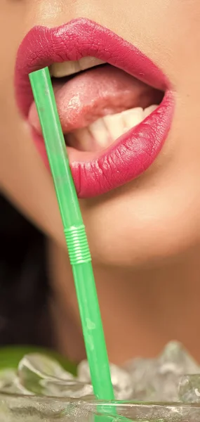 Female tongue licking straw
