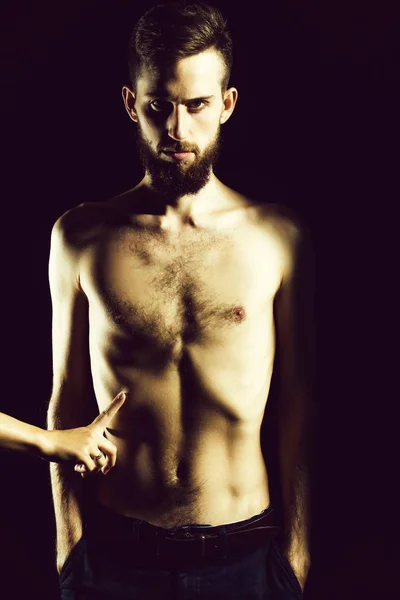 Slim bearded man with thin bare torso isolated on black — Stock Photo, Image