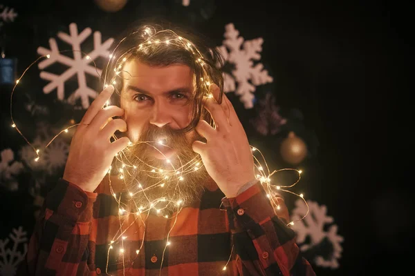 Nieuwjaar man met verlichte draad. — Stockfoto