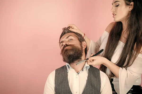 Closeup view of young beautiful couple of fashionable female barber — Stock Photo, Image