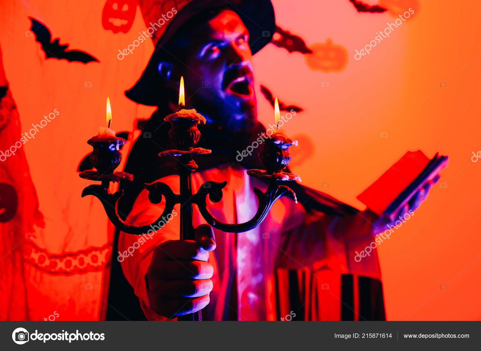 Halloween Decoration And Scary Concept Man Pronounces A Spell