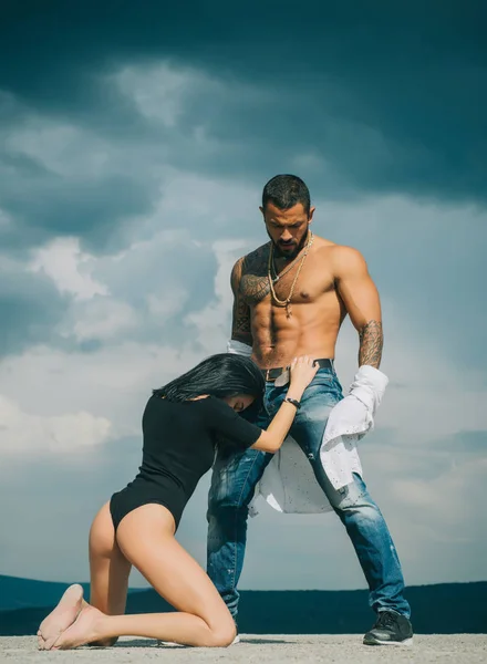 Passionate women making oral sex with muscular man. All-day sex marathon. French style sex. Couple In Love. Intimate relationship and sexual relations. Passionate lover caressing arousing woman. — Stock Photo, Image