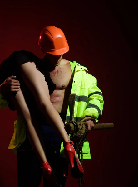 Hot Sexy Baby. Passionate firefighter puts out of the fire a hot girl. Sex protect and sexual life. Man Sexually Harassing woman. Rape and Sexual abuse concept.