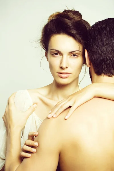 Young sexy couple in studio — Stock Photo, Image