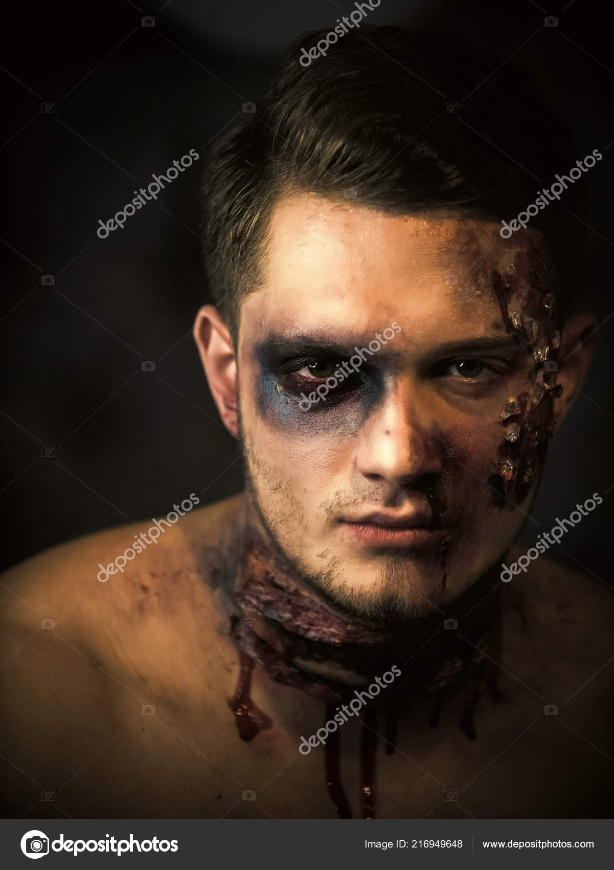 Man in a Halloween Makeup with a Fake Scar on His Cheek · Free Stock Photo
