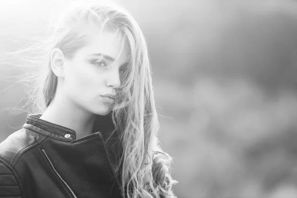 Girl with long hair in leather jacket — Stock Photo, Image