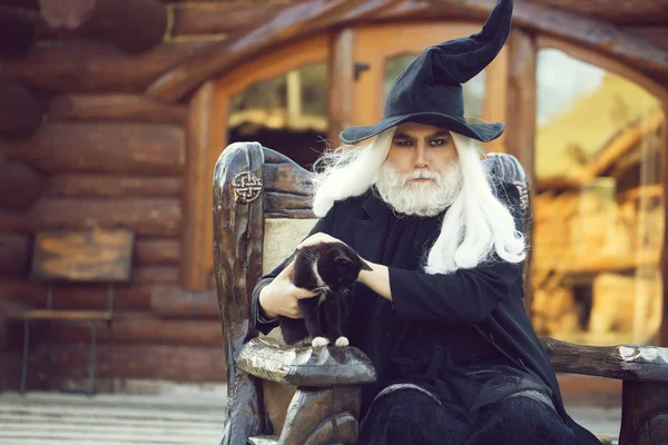 Evil wizard with cat — Stock Photo, Image