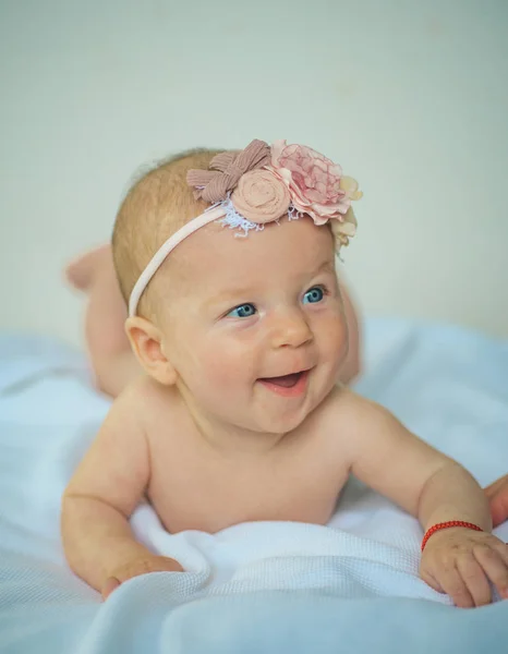 Happy newborn baby. Newborn baby girl. Happy and cute. Health care. Child psychologist. Asking advice of a psychologist. Advice and support. A day care center with heart
