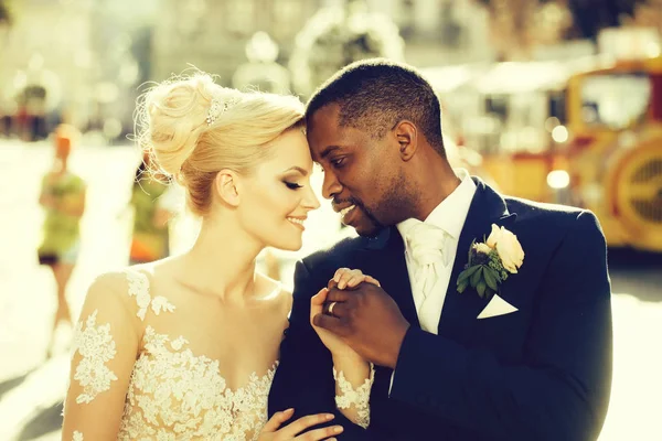 Loving couple of cute bride and african American groom — Stock Photo, Image