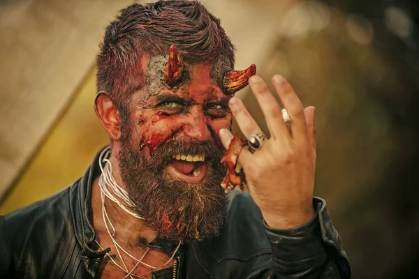 Halloween satan with red blood and wounds on face skin — Stock Photo, Image