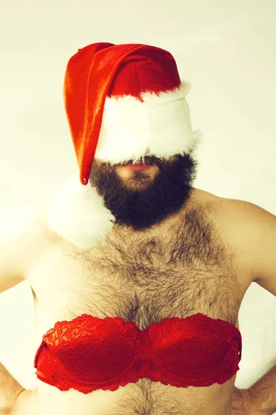 여성 브래지어에 산타 남자 — 스톡 사진