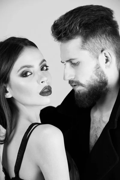 Couple of bearded man, woman in black with fashionable makeup — Stock Photo, Image