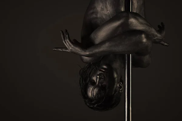 Guy hugs metallic pole. Macho with naked chest, — Stock Photo, Image