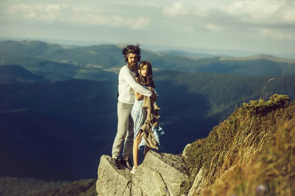 Romantic couple on mountain top