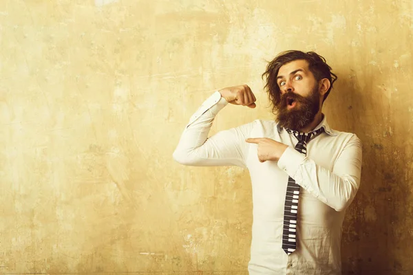 Hipster in shirt and musical tie.