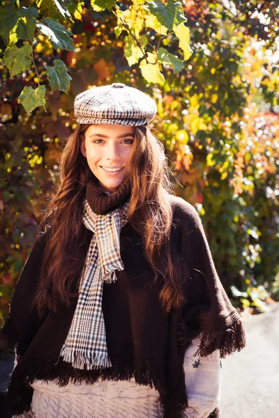 Autumn sale. Autumn outdoor portrait of beautiful happy girl walking in park or forest in warm knitted scarf. — Stock Photo, Image