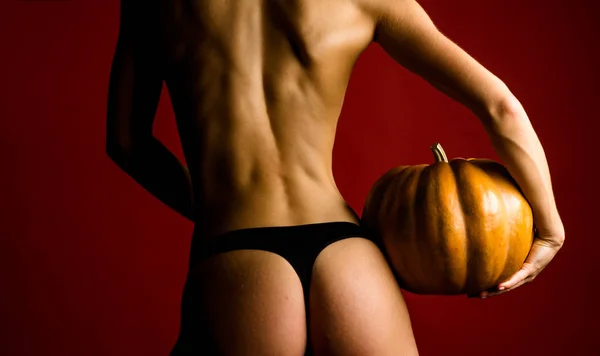 Woman shows a beautiful ass or butt. Autumn time for Fashion sale. Sexy Vampire Woman buttocks. Sexy girl have Best ideas for Halloween. Halloween poster with pumpkins. Night Party background. — Stock Fotó