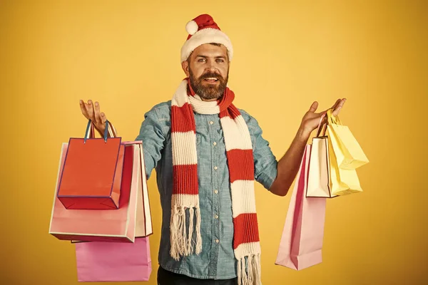 Christmas hipster shopper wear santa hat and scarf