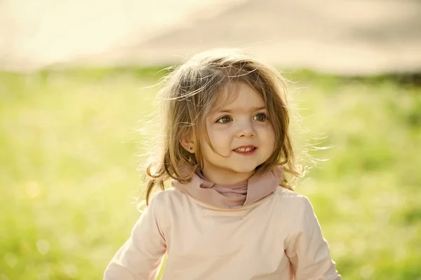 Kid model with long healthy hair on sunny day — Stock Photo, Image