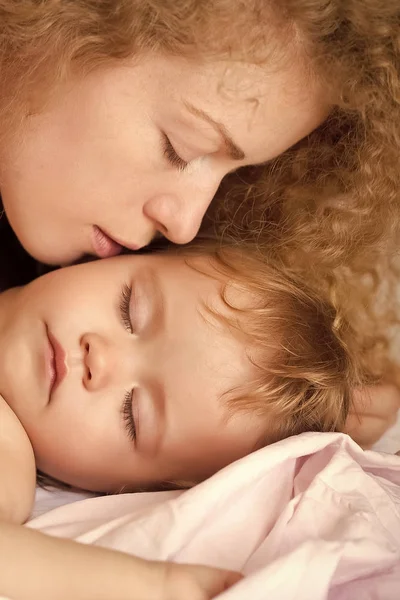 Mother kissing baby — Stock Photo, Image