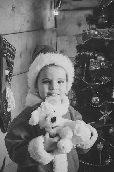 Christmas happy child with toy. — Stock Photo, Image