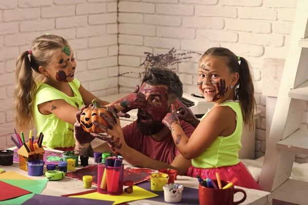 Halloween family with colorful paint. — Stock Photo, Image