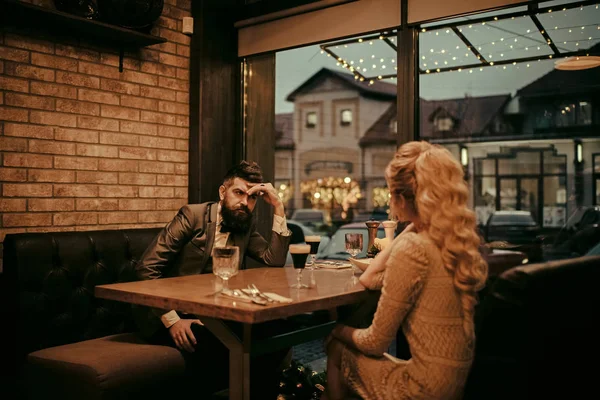 Bad date of couple, break up relations and love. Valentines day with woman and man. Dislike makes conflict and divorce. Business meeting of man and woman. couple with misunderstanding at restaurant