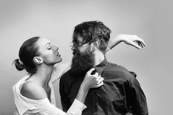 Young stylish sexy couple in studio — Stock Photo, Image