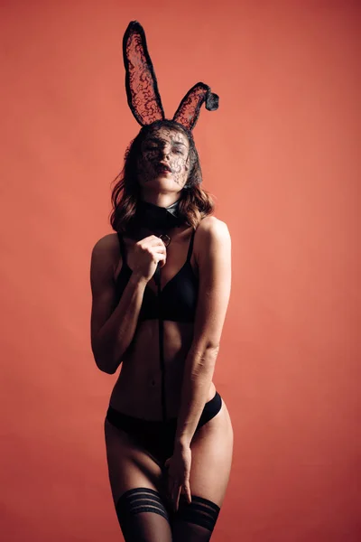 Happy Valentines Day. Brunette posing nude wearing bunny ears. Female with sexy ass posing wearing bunny ears on Easter day. Cute bunny. Expression face. — Stock Photo, Image