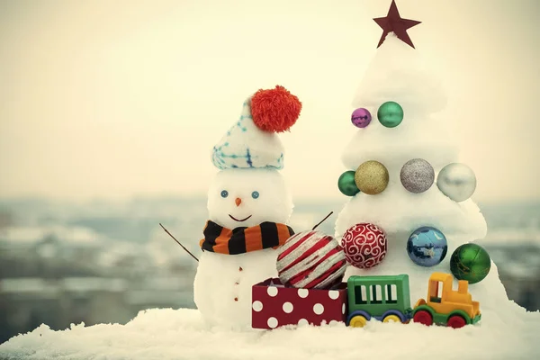 Snow sculptures on white sky background