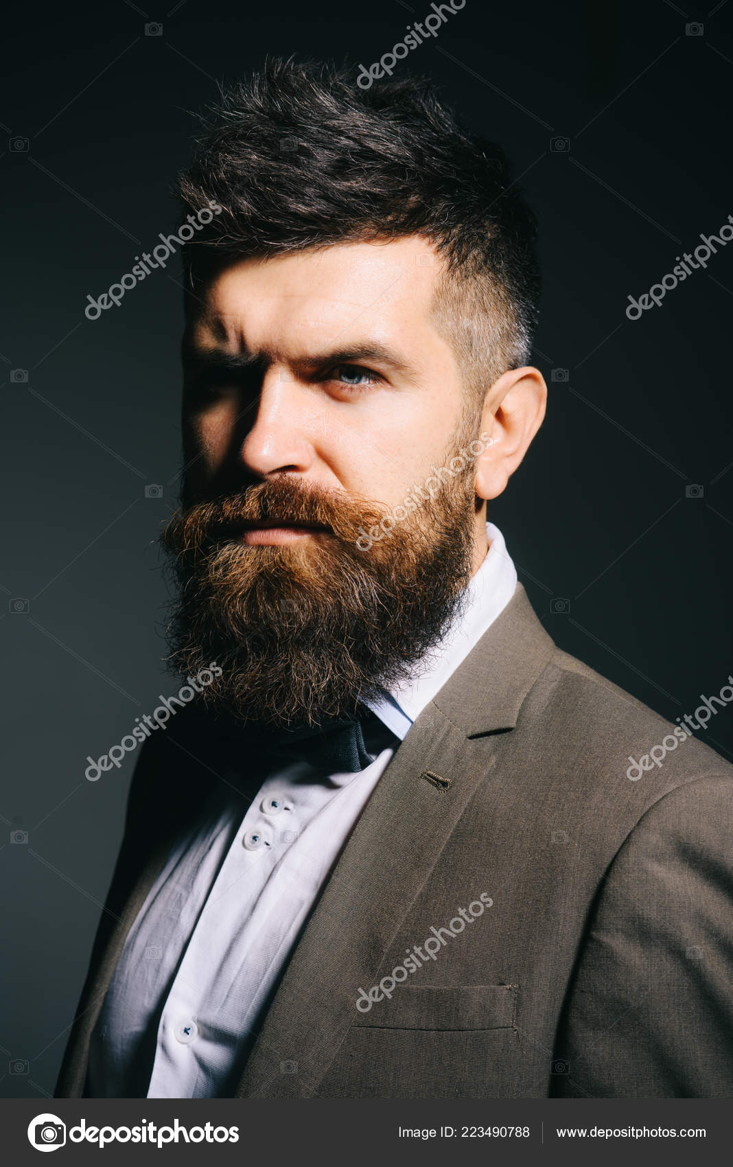 I have a personal barber. Man with long beard in business wear ...