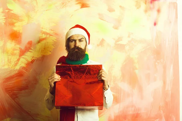Santa claus ember jelen vagy ajándék. — Stock Fotó