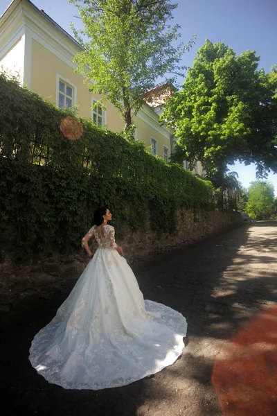 Elegant wedding salon is waiting for bride. Beautiful wedding dresses in boutique. Happy bride before wedding. Wonderful bridal gown. woman is preparing for wedding. Dreams come true. Bride to be — Stock Photo, Image
