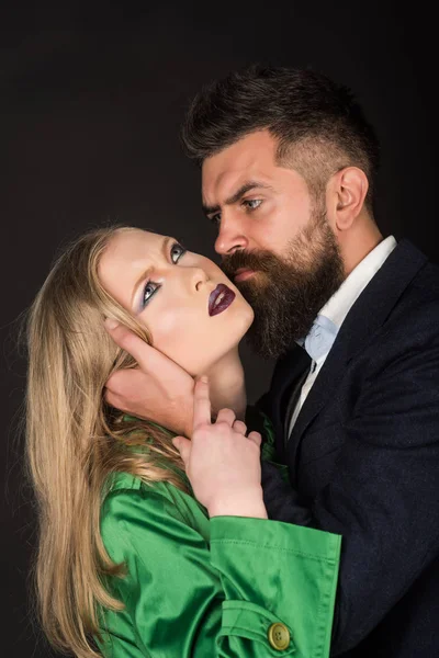 Being sexually intimate in relations. They both love fashion. Intimate couple in fashion clothing. Bearded man hug woman with long hair. Fashion style and hair care. Couple in love. Style icons — Stock Image Being sexually intimate in relations. They both love fashion. Intimate couple in fashion clothing. Bearded man hug woman with long hair. Fashion style and hair care. Couple in love. Style icons Stock Photo