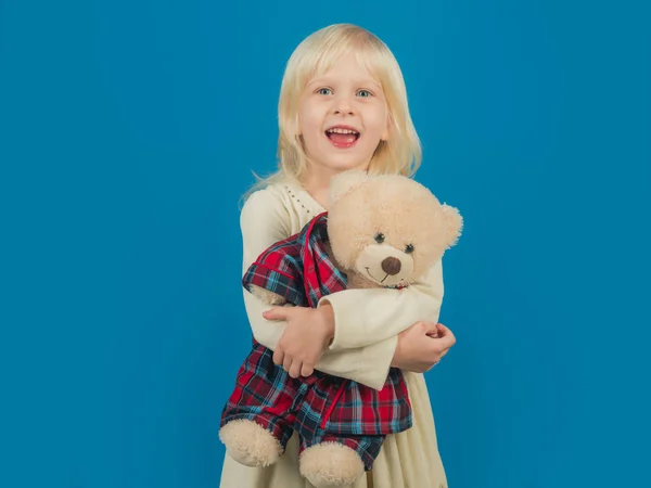 Best present ever. Small girl hold toy bear. Little girl with teddy bear. Little child with soft toy. Small kid happy smiling. Happy childhood. My favorite childhood toy