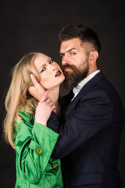 Having a healthy intimate relationship. Couple in love. They both love fashion. Bearded man hug woman with long hair. Intimate couple in fashion clothing. Fashion style and hair care. Style icons — Stock Image Having a healthy intimate relationship. Couple in love. They both love fashion. Bearded man hug woman with long hair. Intimate couple in fashion clothing. Fashion style and hair care. Style icons Stock Photo