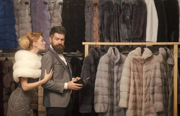 Couple in love among fur coat, luxury.