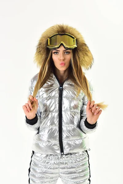 Winter holidays. Christmas time. Enjoying winter holidays together. Sexy woman in winter clothes. Happy holidays. Girl in ski or snowboard wear. Winter sport and activity. Ski resort and snowboarding