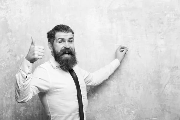 Business man with beard on happy face write with chalk — стоковое фото