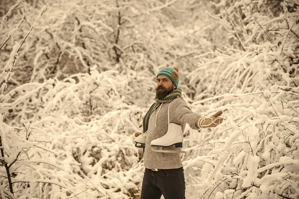 Man in thermal jacket, beard warm in winter.