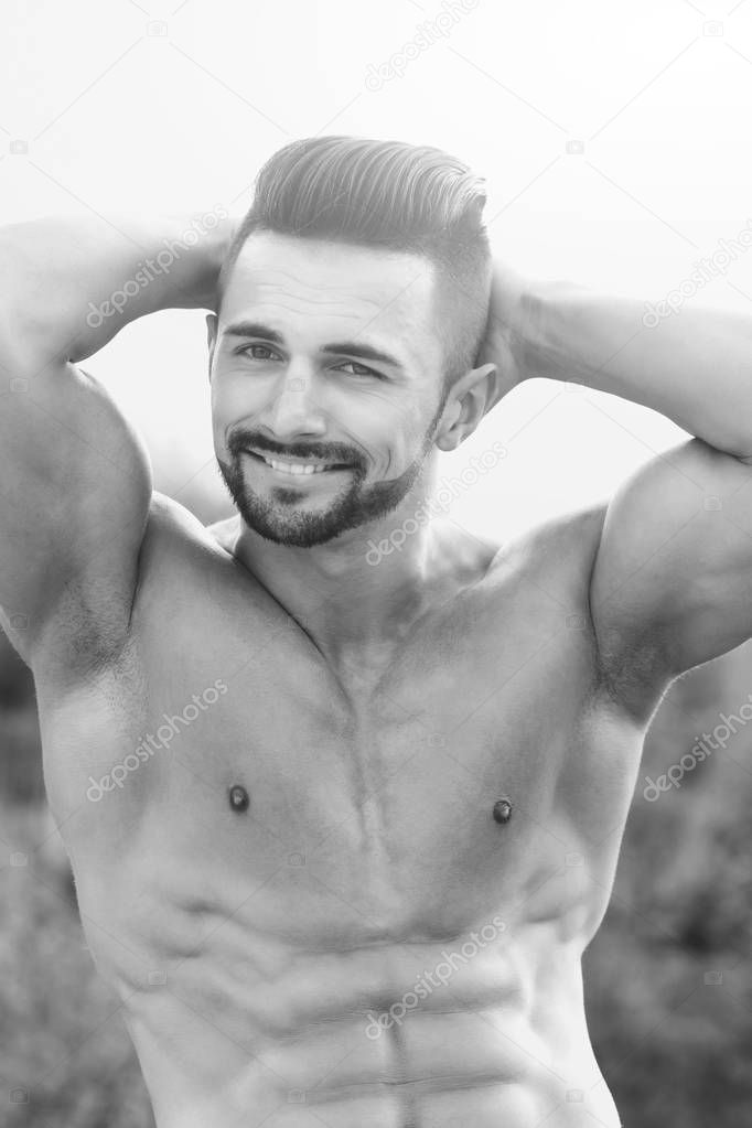 model or happy man with muscular body